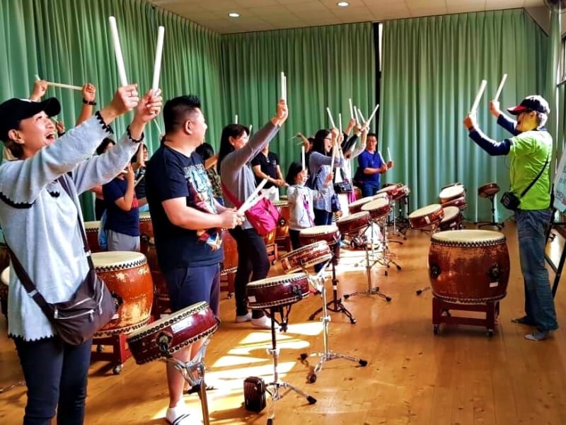 Take a traditional drumming class at the innovative Ten Drum Cultural Park (optional)