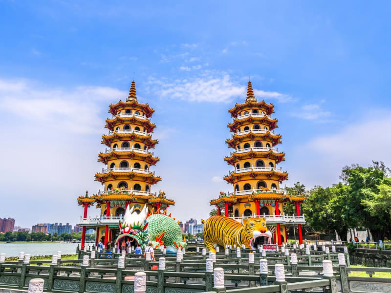 View Tiger Dragon Pagoda, the larger-than-life statues and pagodas at Lotus Pond.